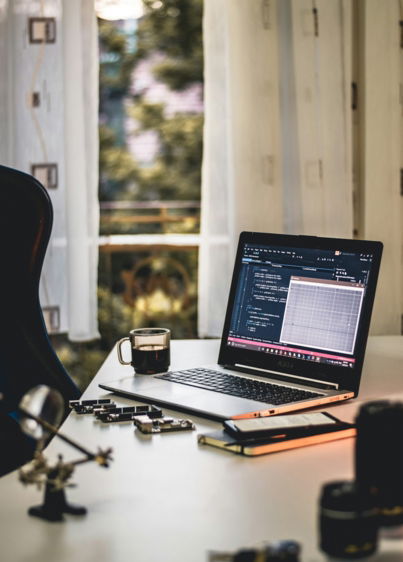 MacBook Pro on white table